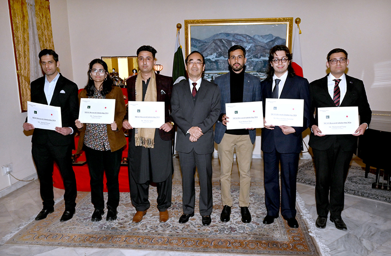 The Ambassador of Japan to Pakistan, WADA Mitsuhiro, in a group photo with the scholarship grantees during a farewell reception at Ambassador’s official residence