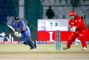 Multan Sultans' batter Yasir Khan plays a shot during the Pakistan Super League (PSL) Twenty20 cricket final match between Islamabad United and Multan Sultans at the National Stadium