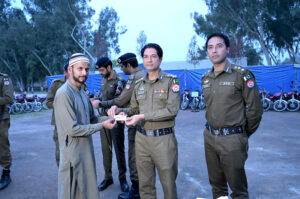 RPO Sargodha Shariq Kamal Siddiqui and DPO Sargodha Muhammad Faisal Kamran talking to the media during the ceremony of handing over the stolen property to the public at Sargodha Police Line