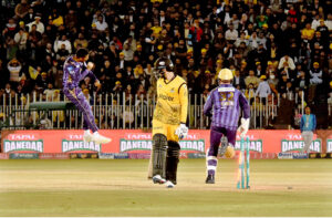Peshawar Zalmi batter Babar Azam celebrates his half century (50 runs) score during the Pakistan Super League (PSL) Twenty20 cricket match at the Rawalpindi Cricket Stadium