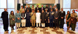 Ambassador Masood Khan hoisting national flag on Pakistan Dayat the Embassy of Pakistan