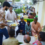Volunteers distribute food among the people in fast during the Holy Month of Ramadan at Hussainabad