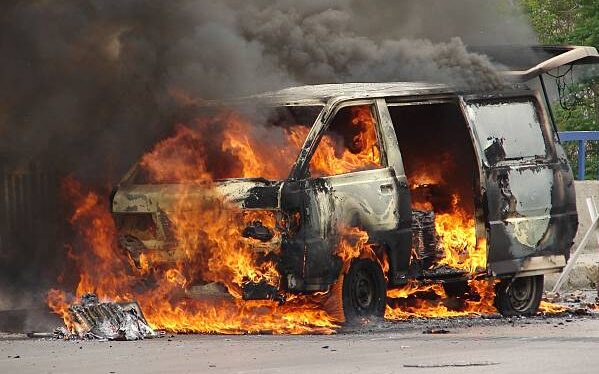 Students escape unhurt after school van catches fire in Jhelum