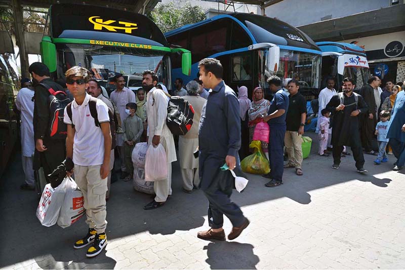 People purchasing tickets and waiting for transport to travel their hometowns to celebrate Eid ul Fitr with their loved ones at Faizabad Bus Stand.
