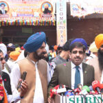 Additional Secretary Punjab, Rana Shahid Saleem accompanied by Provincial Minister Punjab Pakistan and president PSGPC, Ramesh Singh Aroar is talking to the media on the arrival of Sikh Yatrees at Wagah Border