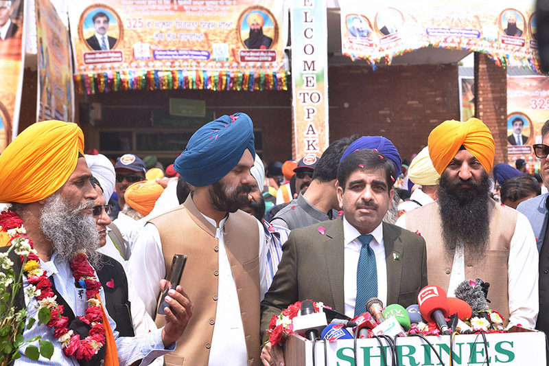 Additional Secretary Punjab, Rana Shahid Saleem accompanied by Provincial Minister Punjab Pakistan and president PSGPC, Ramesh Singh Aroar is talking to the media on the arrival of Sikh Yatrees at Wagah Border