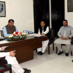 Federal Minister for Kashmir Affairs, Gilgit-Baltistan, and SAFRON, Engineer Amir Muqam addressing a meeting during the visit of commissioner office Afghan refugees Punjab