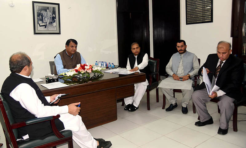 Federal Minister for Kashmir Affairs, Gilgit-Baltistan, and SAFRON, Engineer Amir Muqam addressing a meeting during the visit of commissioner office Afghan refugees Punjab