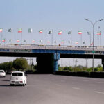 Pakistan and Iran National Flags adorn on bridge in Federal Capital ahead of the Iranian President's state visit