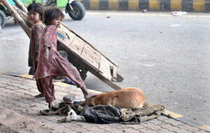 Gypsy children playing on 6th Road during morning time.
