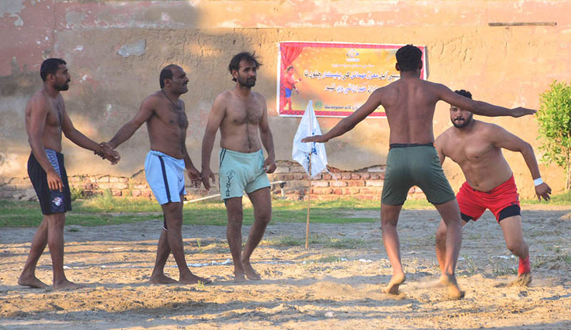 Players in action during Kabaddi match playing between Punjab and Sindh teams at Qasimabad Sports Complex