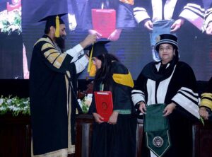 Governor of Punjab, Muhammad Baligh Ur Rehman awarding degrees among the successful students during the 4th Convocation of Government College Women University Faisalabad (GCWUF).