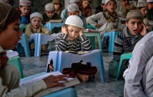 Madrassa students reciting holy Quran during fasting month of Ramadan at Jamia Anwaar ul Aloom near Banni chowk.