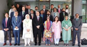 Secretary BISP, Amer Ali Ahmad and Directing Staff of NIM, Ms. Samreen Zahra, join the officers of 35th Senior Management Course (SMC) for a group photograph during their visit to BISP Headquarters.