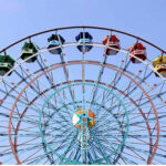 A man showing his skills on bike in a circus show at Sardaryab River picnic point