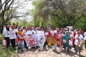 Representatives of PRCS, IFRC, ICRC, Norwegian Red Cross, Turkish Red Crescent, German Red Cross and volunteers participating in hiking on the occasion of World Hemophilia Day at Margalla Hills, Trail 5 in Federal Capital.
