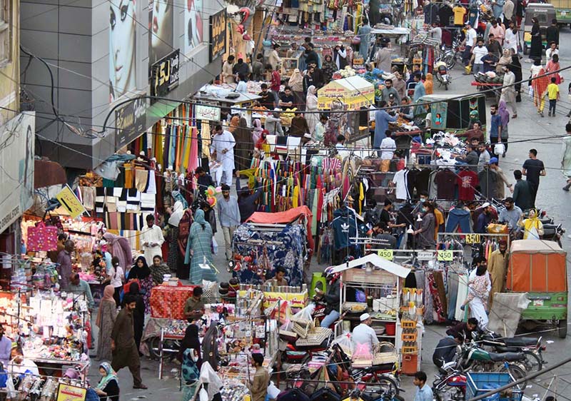 People are busy in shopping for Eid ul Fitr Festival at Commercial Market