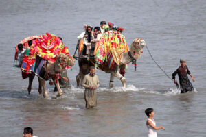 Visitors enjoy boat riding at Sardaryab picnic point on the 3rd day of Eid ul Fitr celebrations