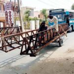 Motorcycle rickshaw loaded with iron poles may cause any accident and needs attention of concerned authorities