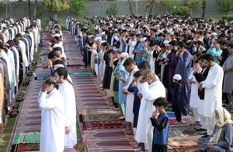 A large number of faithful offering Eidul-Fitr prayer at Government Degree College
