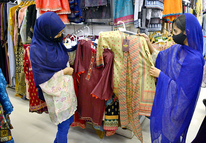Deserving girls busy shopping in preparation of upcoming Eid ul fitr arrange by Al-Khidmat foundation at Dawood shopping mall.
