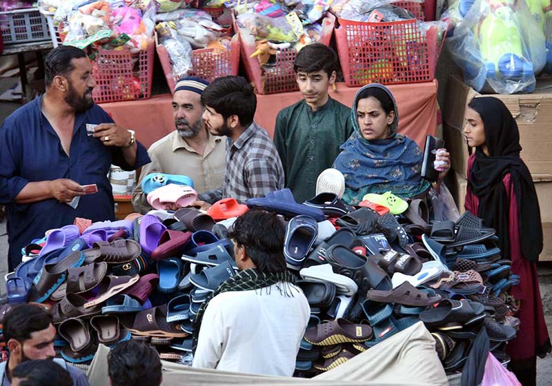 People are busy in shopping for Eid ul Fitr Festival at Commercial Market