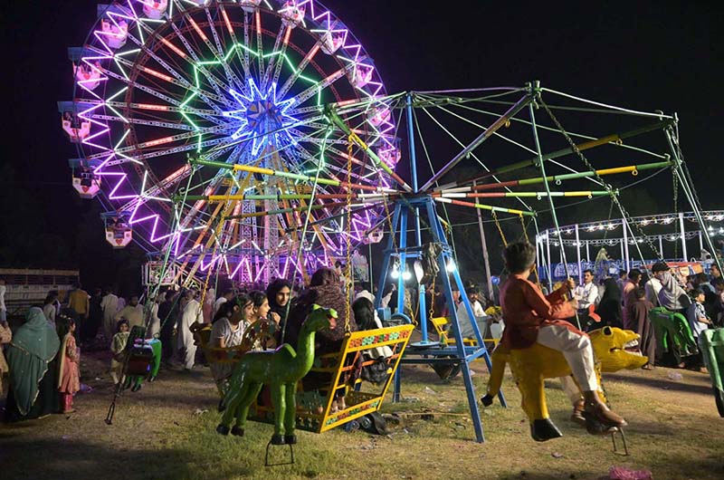 Children enjoying swings during Flora Festival organized by PHA