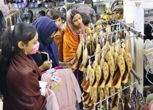 Deserving girls busy shopping in preparation of upcoming Eid ul fitr arrange by Al-Khidmat foundation at Dawood shopping mall.