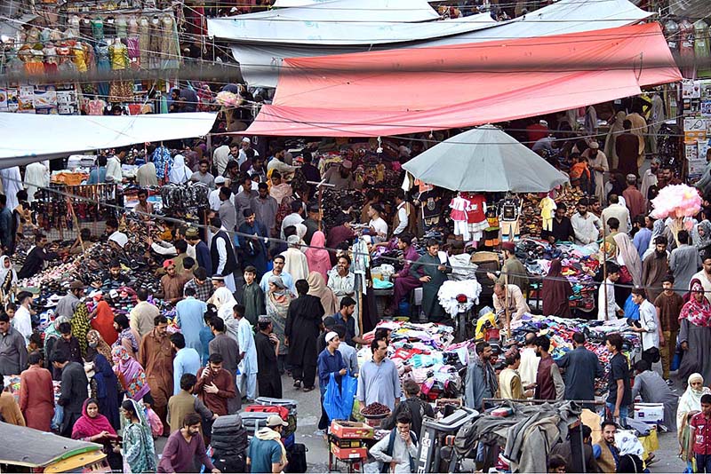 People are busy in shopping for Eid ul Fitr Festival at Commercial Market