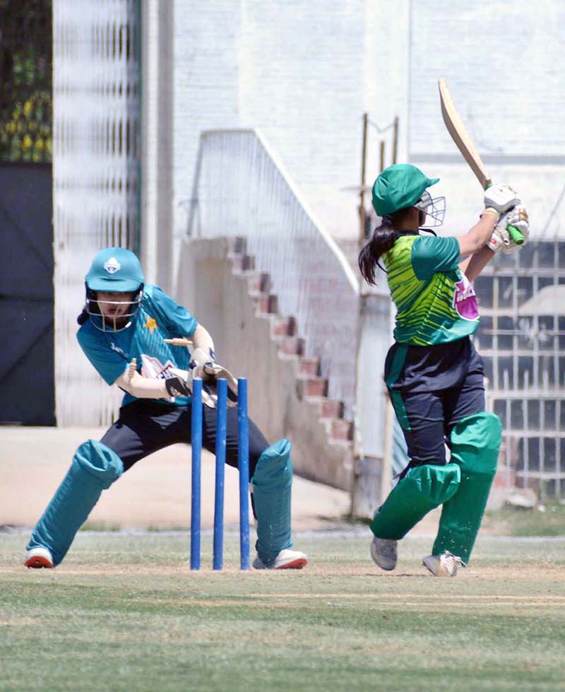 Players in action during cricket match played between Multan Women Cricket and Karachi Women Cricket teams during National Women's One Day Cricket Tournament 2024 at Iqbal Stadium.