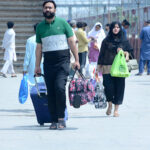 People arriving back to the city after spending Eid holidays with their family members in hometowns