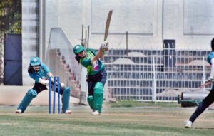 Players in action during cricket match played between Multan Women Cricket and Karachi Women Cricket teams during National Women's One Day Cricket Tournament 2024 at Iqbal Stadium.