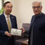 Minister for Defence, Khawaja Muhammad Asif presenting a souvenir to H.E. Wada Mitsuhiro, Ambassador of Japan
