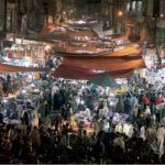 A large number of people busy in shopping for Eid ul-Fitr festival at Raja Bazaar