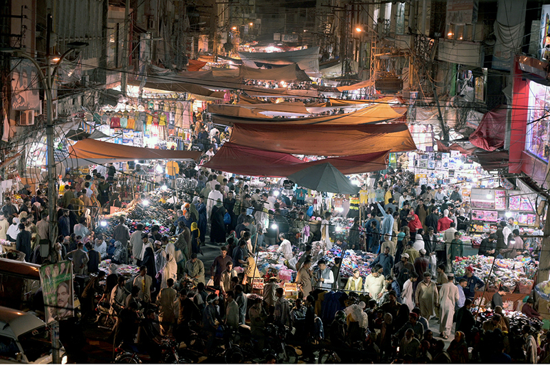 A large number of people busy in shopping for Eid ul-Fitr festival at Raja Bazaar