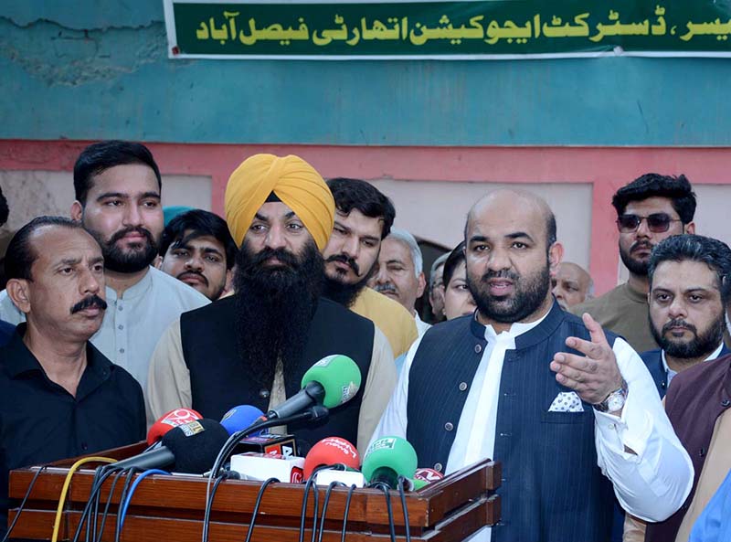 Provincial Minister for Education Rana Sikandar Hayat and Provincial Minister for Minority Affairs Sardar Ramesh Singh Arora talking to media person during their visit to Government Pakistan Model High School Rail Bazar