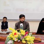 A participant reciting Holy Quran during the Husn-e-Qiraat and Natia competition at KIU