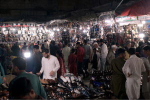 A large number of people busy in shopping for Eid ul-Fitr festival at Raja Bazaar