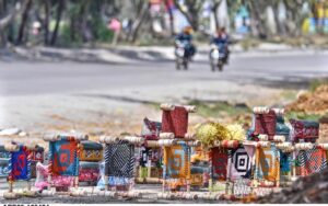 A vendor displaying the models of the charpis at roadside to attract the customers at Peshawar More.