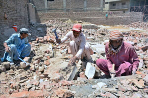 Labourers busy in break the bricks to earn livelihood at Peratabad as International Labour Day is celebrated on May 1 every year. It's a day to honour and appreciate the contributions of workers all around the world. This day recognizes the hard work and dedication of people who work in various fields to make our lives better.