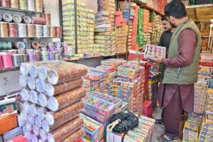 A vendor displaying colorful bangles to attract the customers in preparation of upcoming Eidul Fitr festives.