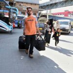 People arrives at Faizabad Bus Stand to travel their hometowns to celebrate Eid ul Fitr with their loved ones