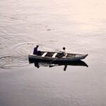 Youngsters enjoying boat ride in River Ravi during evening time in Provincial Capital