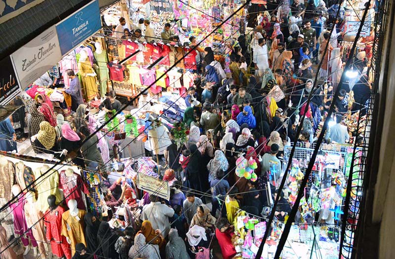 People busy in Eidul Fitr shopping at a market in the city