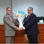 Director General, Federal Judicial Academy, Mr Hayat Ali Shah presenting a bouquet of flowers to Hon'ble Mr. Justice Athar Minallah in a certificate awarding ceremony at the Federal Judicial Academy