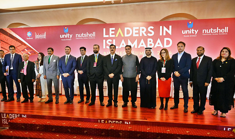 Chairman Senate Syed Yusuf Raza Gilani in a group photograph with participants of Leaders in Islamabad Business Summit 2024 collaborating for Growth.