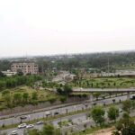 A beautiful view of Peshawar Mor Fly over during rainy weather in the Federal Capital.