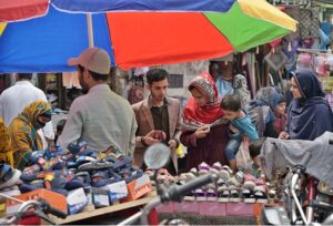 People busy in doing Eid shopping at Commercial market ahead of Eidul –Fitr.
