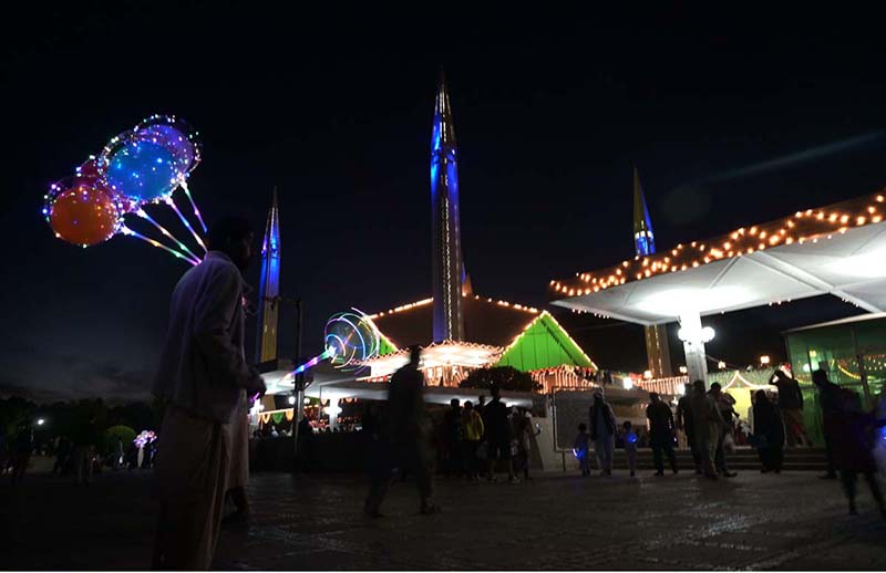An illuminated view of Faisal Masjid decorated with colourful lights in connection with Shab-e-Qadar on 27th day of Holy fasting month of Ramzanul Mubarak