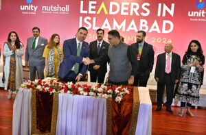 Chairman Senate Syed Yusuf Raza Gilani in a group photograph with participants of Leaders in Islamabad Business Summit 2024 collaborating for Growth.